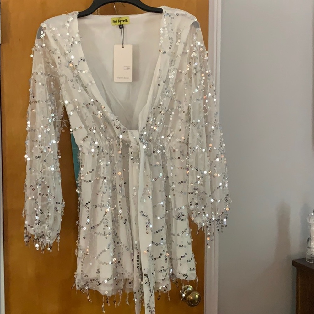 NWT white with silver sequins romper